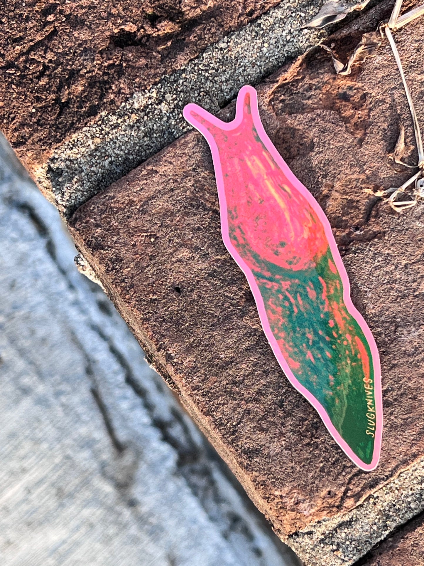 orange and green slug sticker